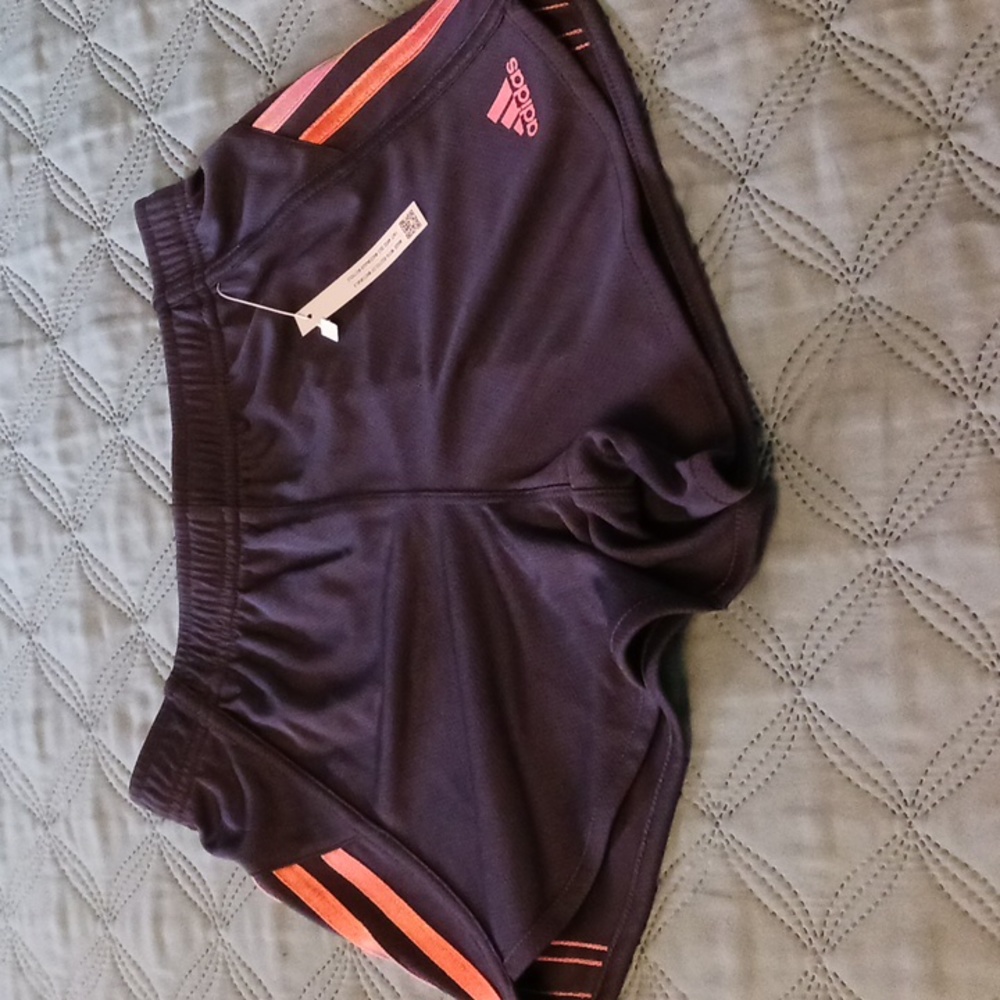 Girl's shorts in navy, size M by Adidas.